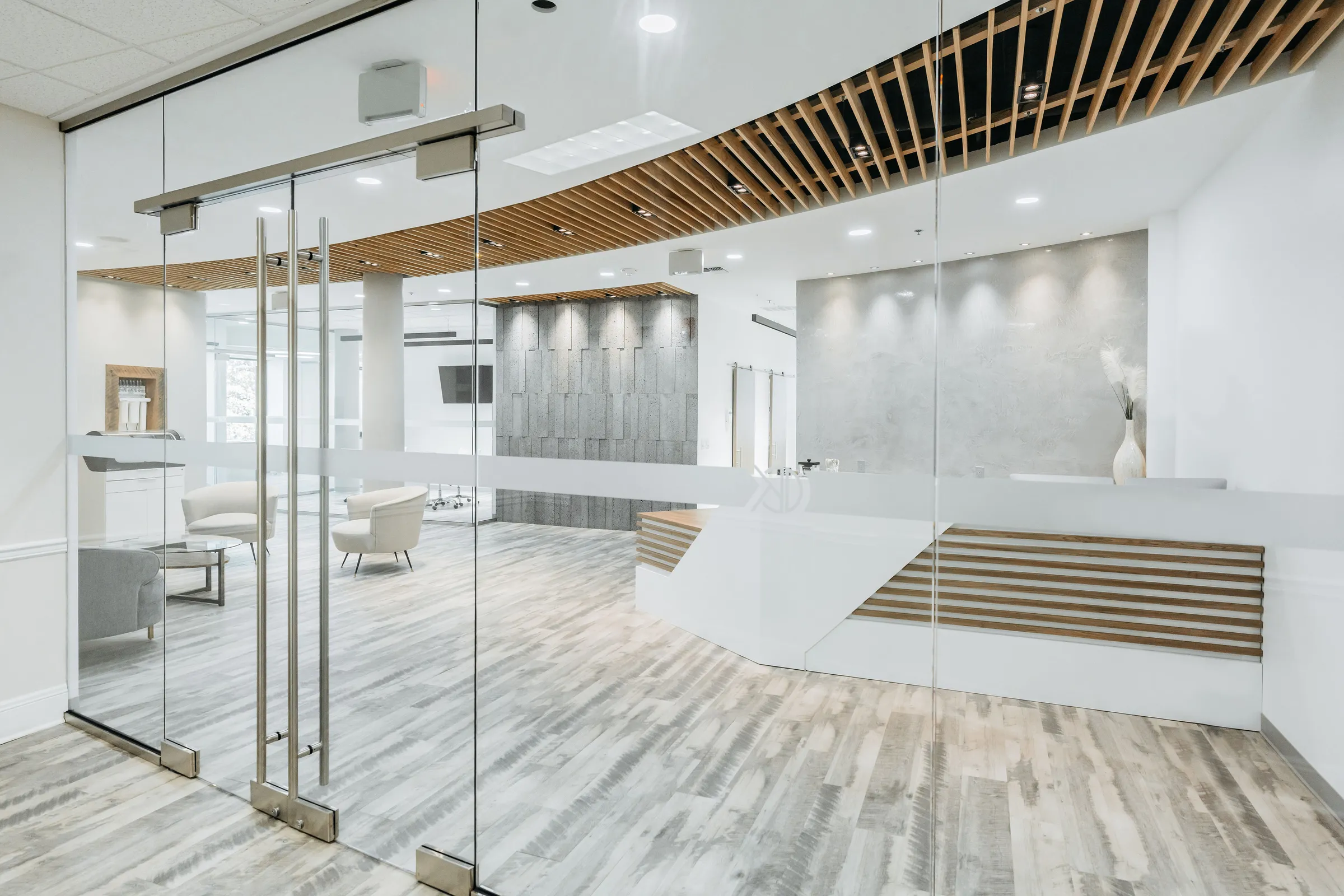 The bright, modern reception area at Charles Kim Dentistry