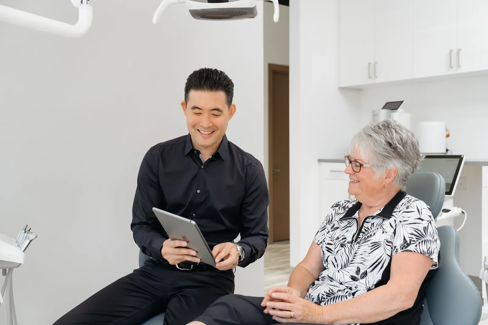 Dr. Charlie talking with a patient